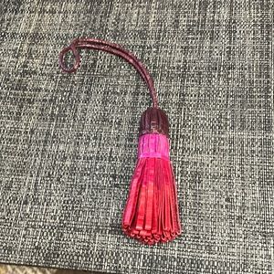 Nancy Gonzalez tassle